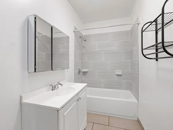 a kitchen with a sink stove and refrigerator