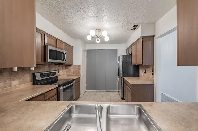 $233,500 | 6107 Spyglass Lane, Garland, TX 75043