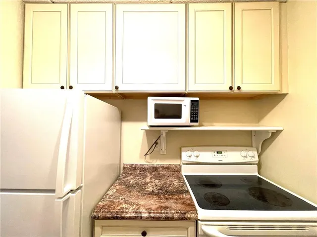 a view of hallway with stairs