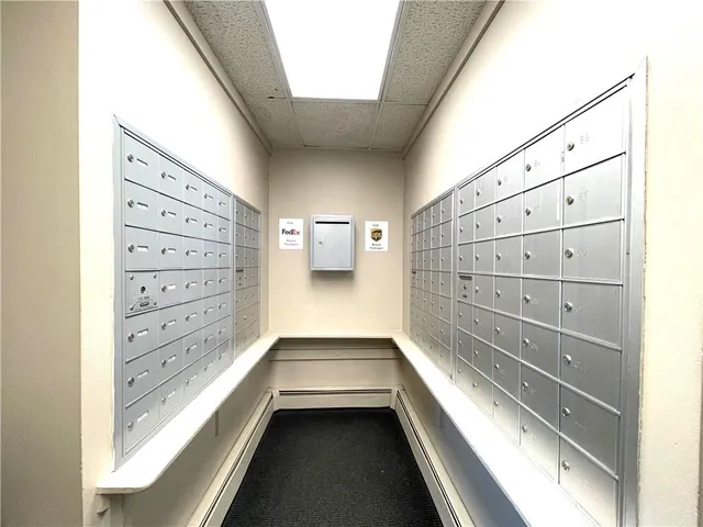 a view of a swimming pool with an outdoor seating