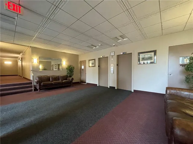 a view of a livingroom with furniture