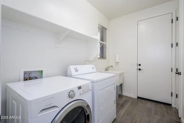 a utility room with dryer and washer