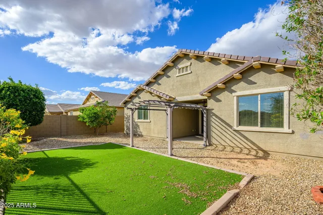 a view of a back yard of the house