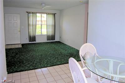 7270 Lobelia Road Fort Myers, FL 33967 - Photo 5 of 6 a front view of a house with garden