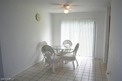 7270 Lobelia Road Fort Myers, FL 33967 - Photo 6 of 6 a view of a dining room with furniture and window