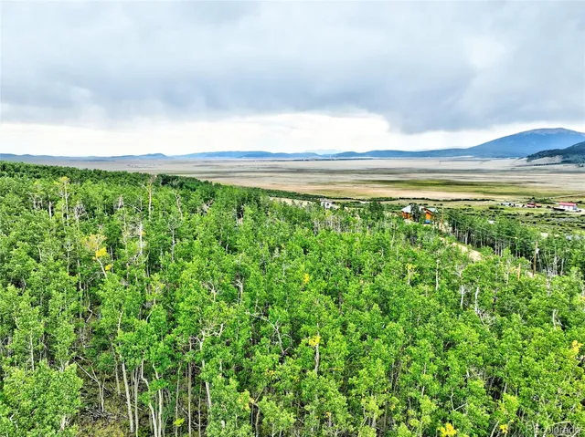 a view of a field with an outdoor space