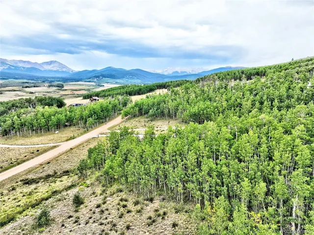 a view of mountain with lake view