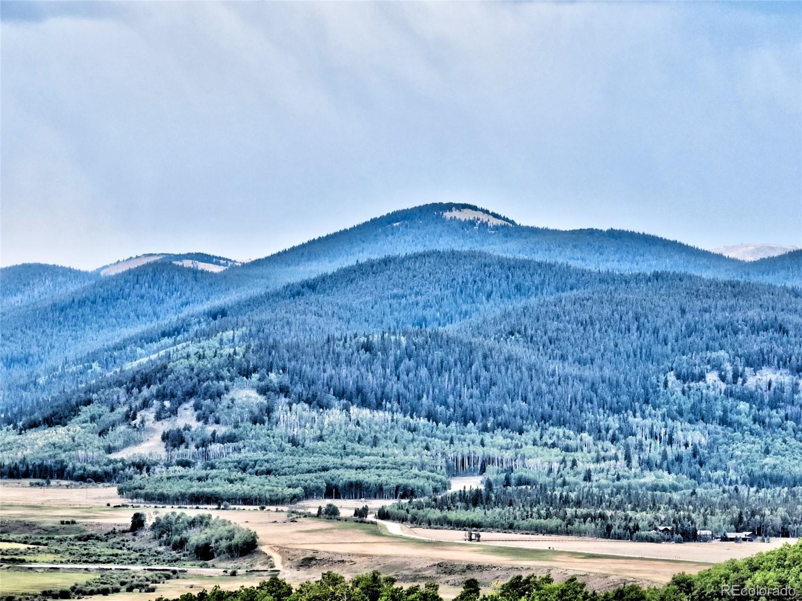 528 Glacier Peak View Road Jefferson, CO 80456 - Photo 22 of 44 front view of a house with a yard