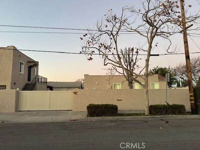 a view of a street with a house