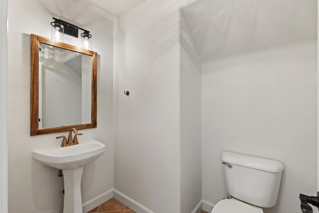 6012 Piros Way Oceanside, CA 92056 - Photo 21 of 47 downstairs hall powder room