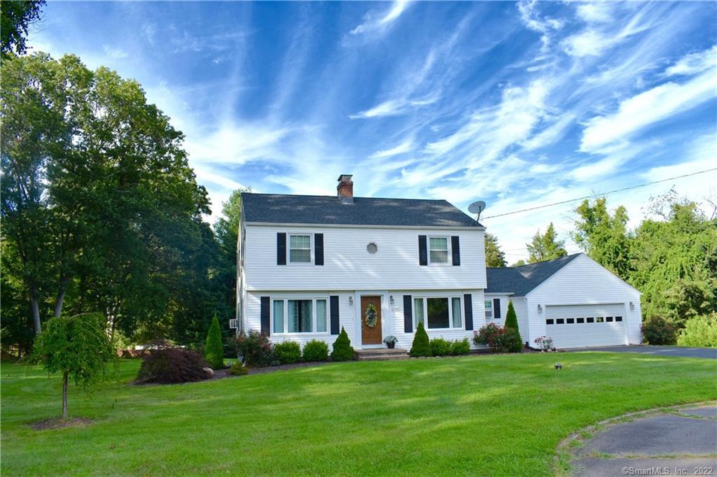 1385 Rhey Avenue Wallingford, CT 06492 - Photo 1 of 1 a front view of a house with a garden