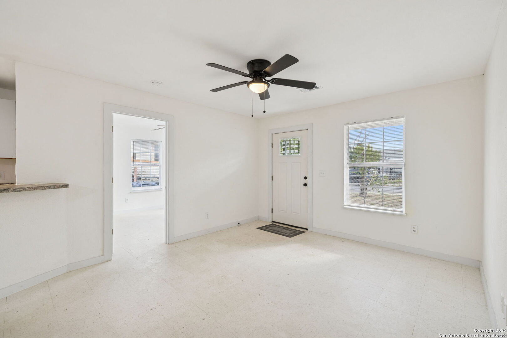1349 Rivas Street San Antonio, TX 78207 - Photo 10 of 35 a view of an empty room with a window