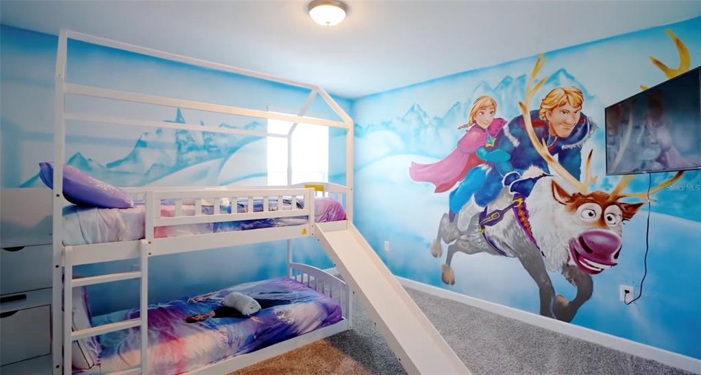 2940 Simile Street Kissimmee, FL 34746 - Photo 5 of 51 a room with toys and a view of living room