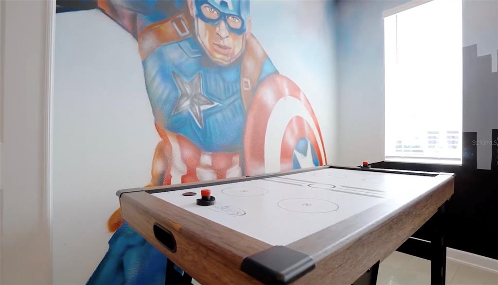 2940 Simile Street Kissimmee, FL 34746 - Photo 9 of 51 a view of a room with furniture and wooden floor