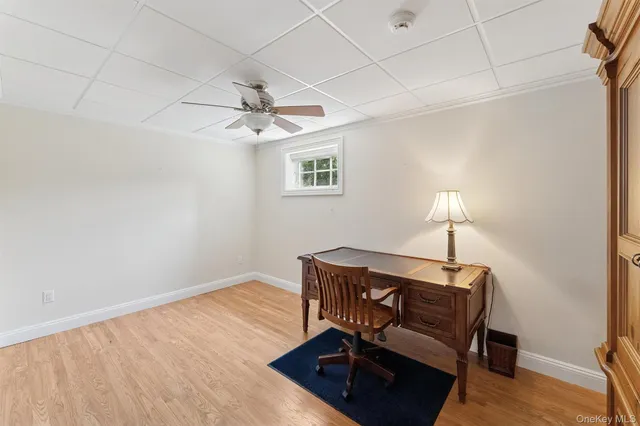 a room with furniture and a lamp