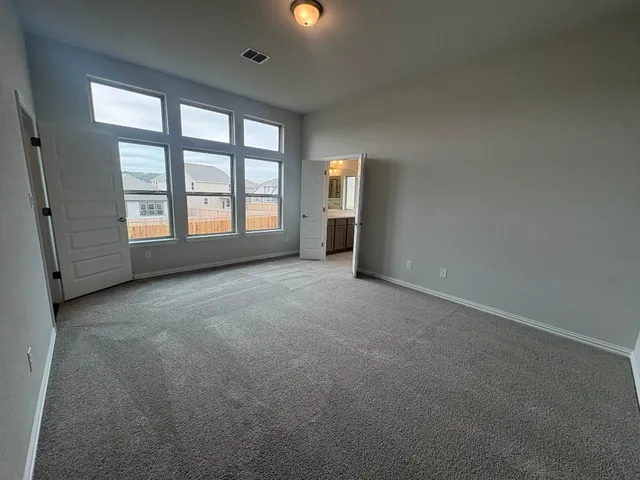 a view of balcony with a floor to ceiling window and wooden floor