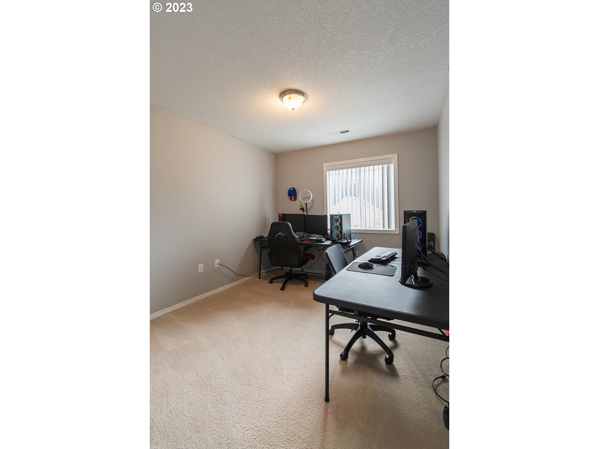 3148 South 3rd Way Ridgefield, WA 98642 - Photo 13 of 27 a room with furniture and a window