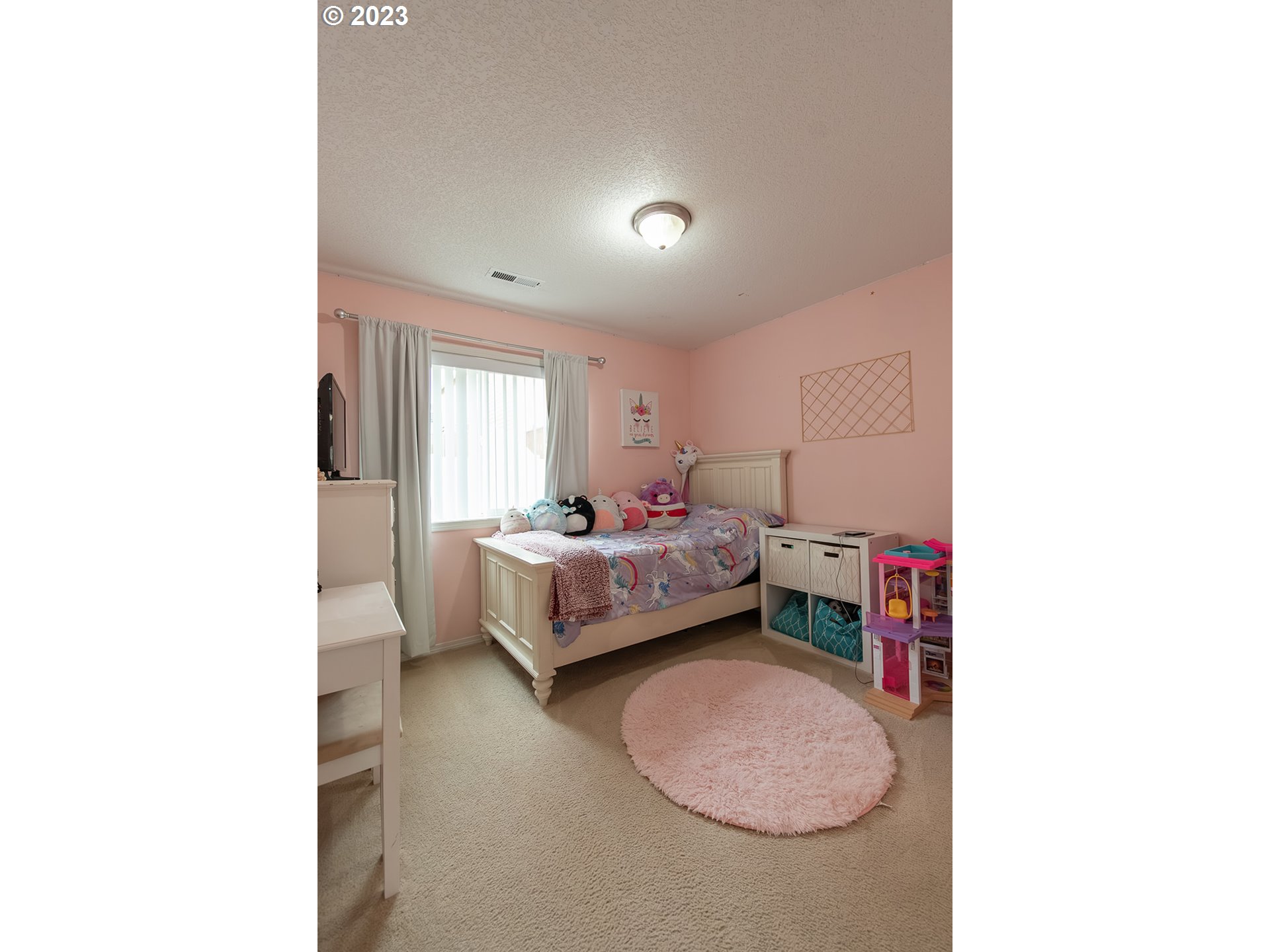 3148 South 3rd Way Ridgefield, WA 98642 - Photo 15 of 27 a room with a bed and a window
