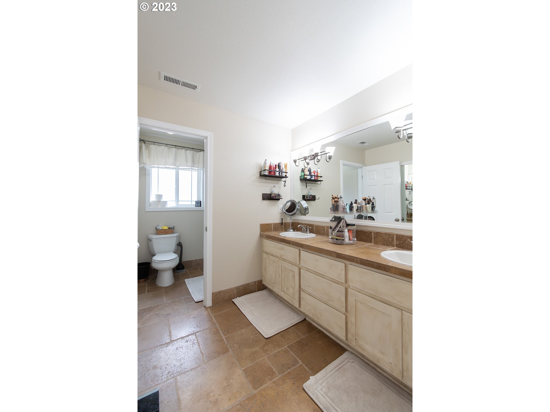 3148 South 3rd Way Ridgefield, WA 98642 - Photo 20 of 27 a bathroom with a sink and a mirror