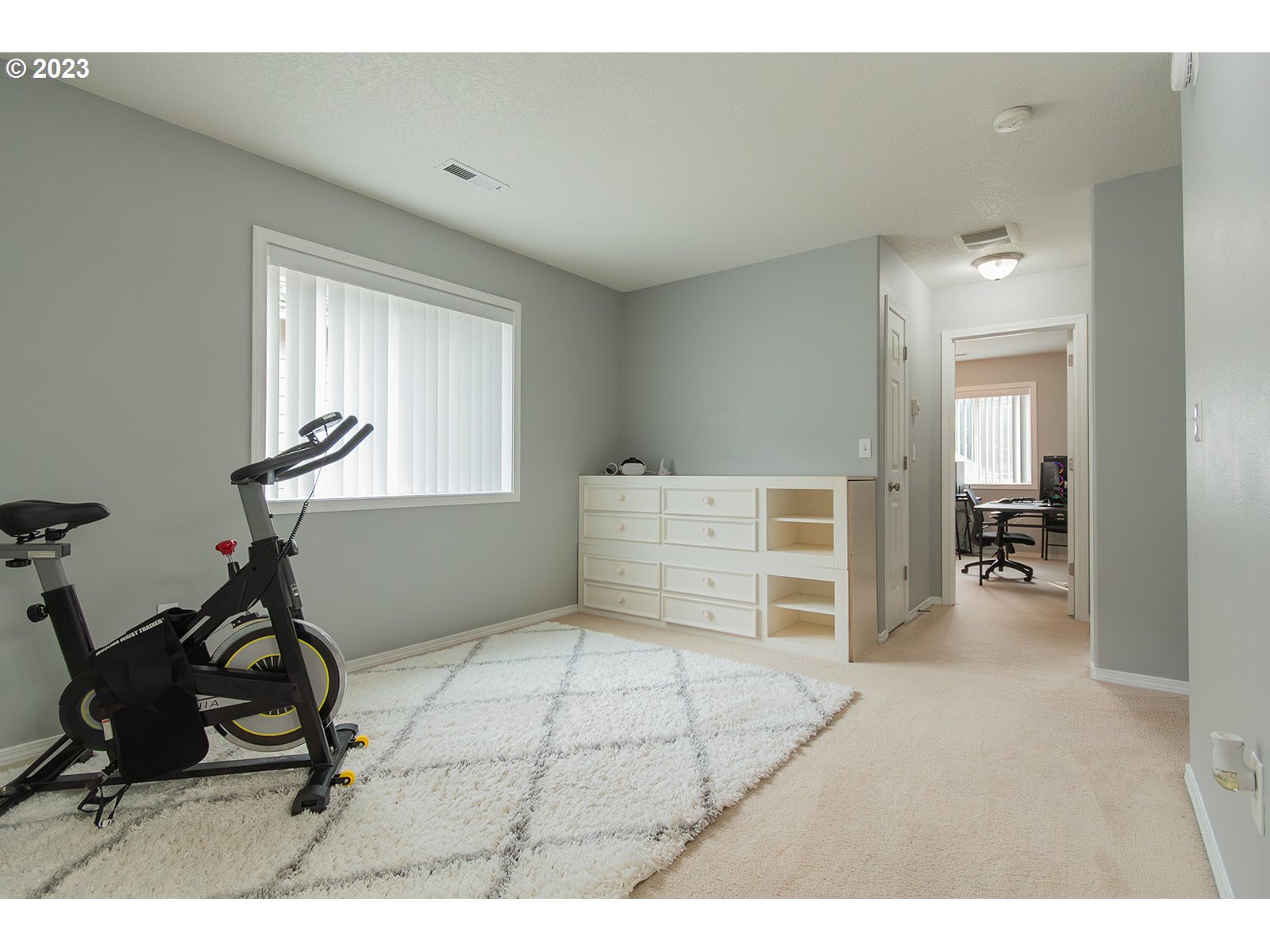 3148 South 3rd Way Ridgefield, WA 98642 - Photo 22 of 27 a room with furniture and a window