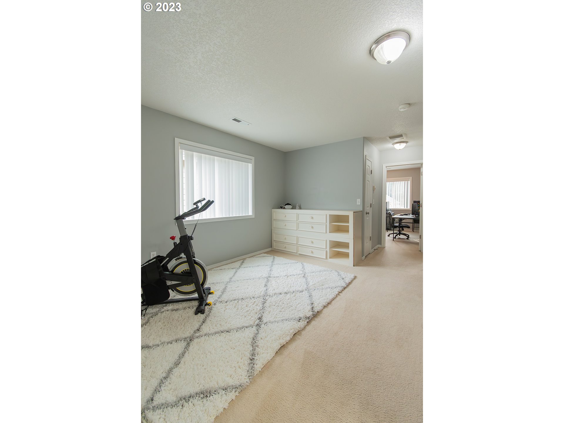 3148 South 3rd Way Ridgefield, WA 98642 - Photo 23 of 27 a living room with furniture and a window