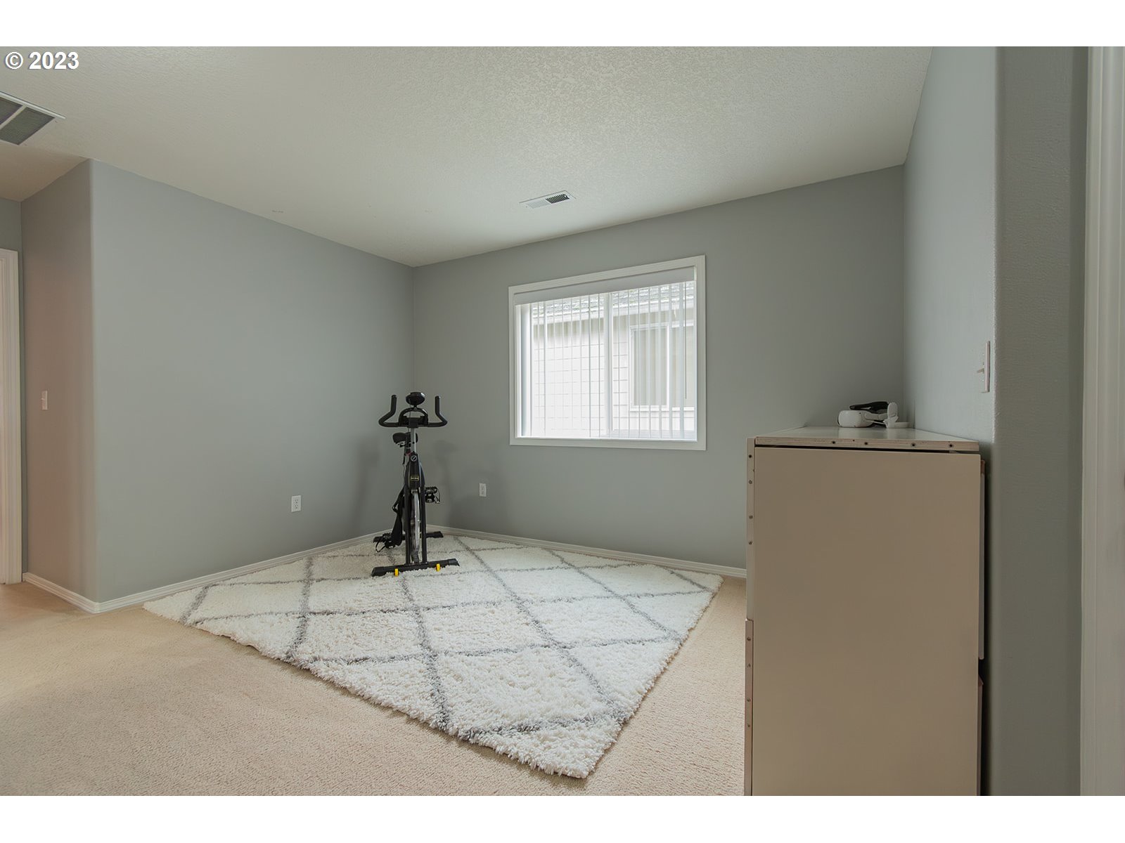 3148 South 3rd Way Ridgefield, WA 98642 - Photo 24 of 27 a bedroom with a bed and a window