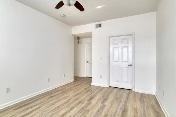 a view of building with river in front of it