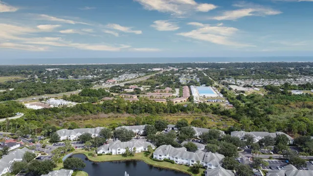 a view of a lake with a large trees
