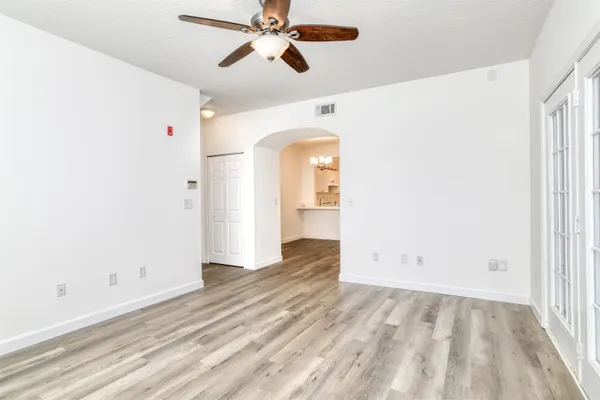 a kitchen with a sink cabinets and window