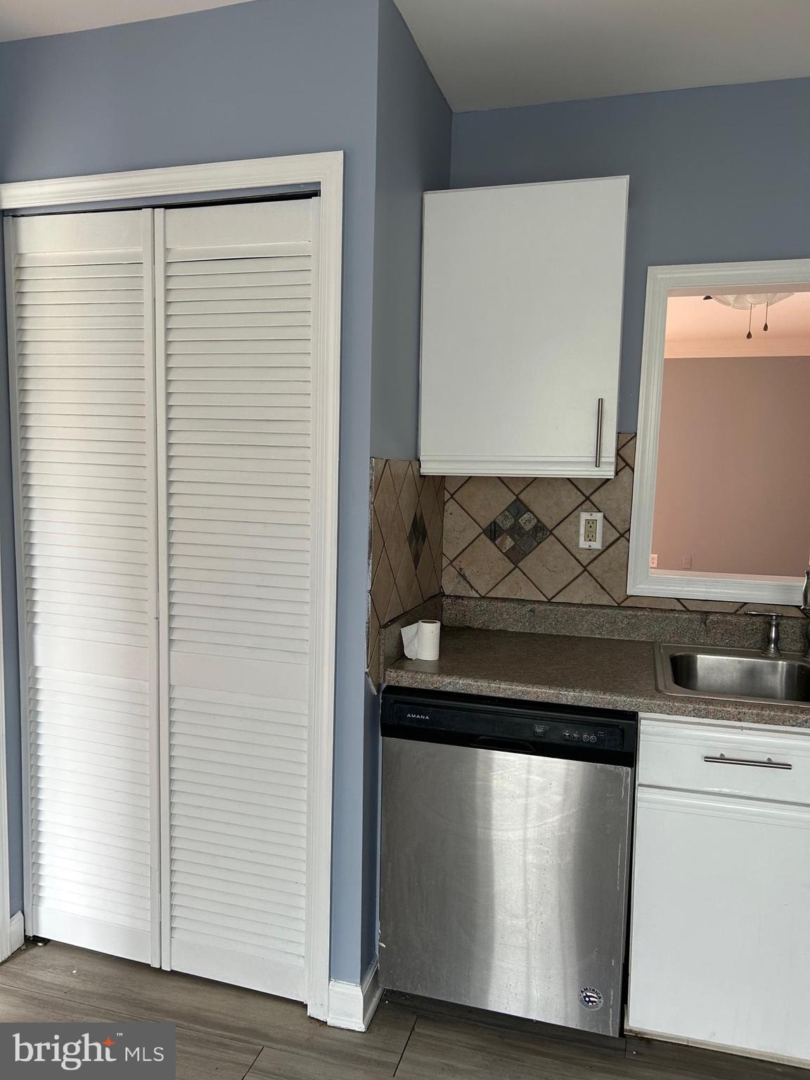 332 Cold Spring Place Dover, DE 19904 - Photo 2 of 10 a kitchen with a sink and cabinets
