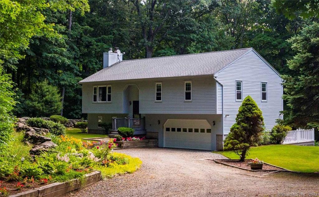 a view of house with outdoor entertaining spaces
