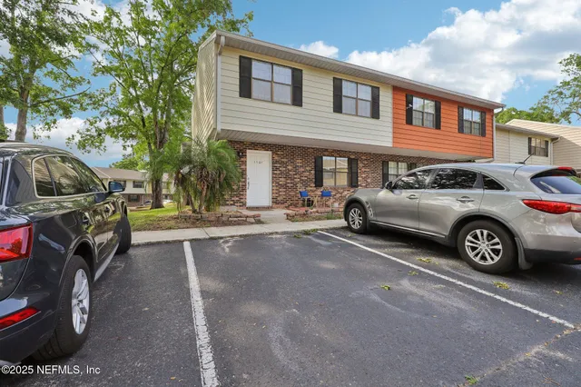 a car parked in front of a house