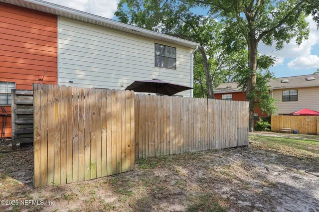 a view of a swimming pool with an outdoor seating