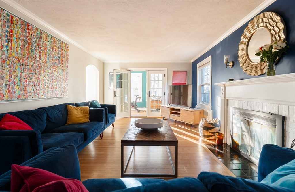 23 Regina Road Newton, MA 02466 - Photo 14 of 33 a living room with furniture and a fireplace