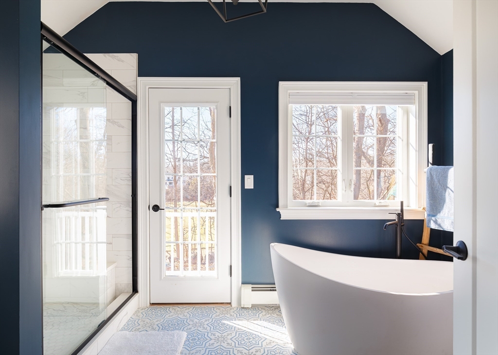 23 Regina Road Newton, MA 02466 - Photo 20 of 33 a living room with furniture and windows
