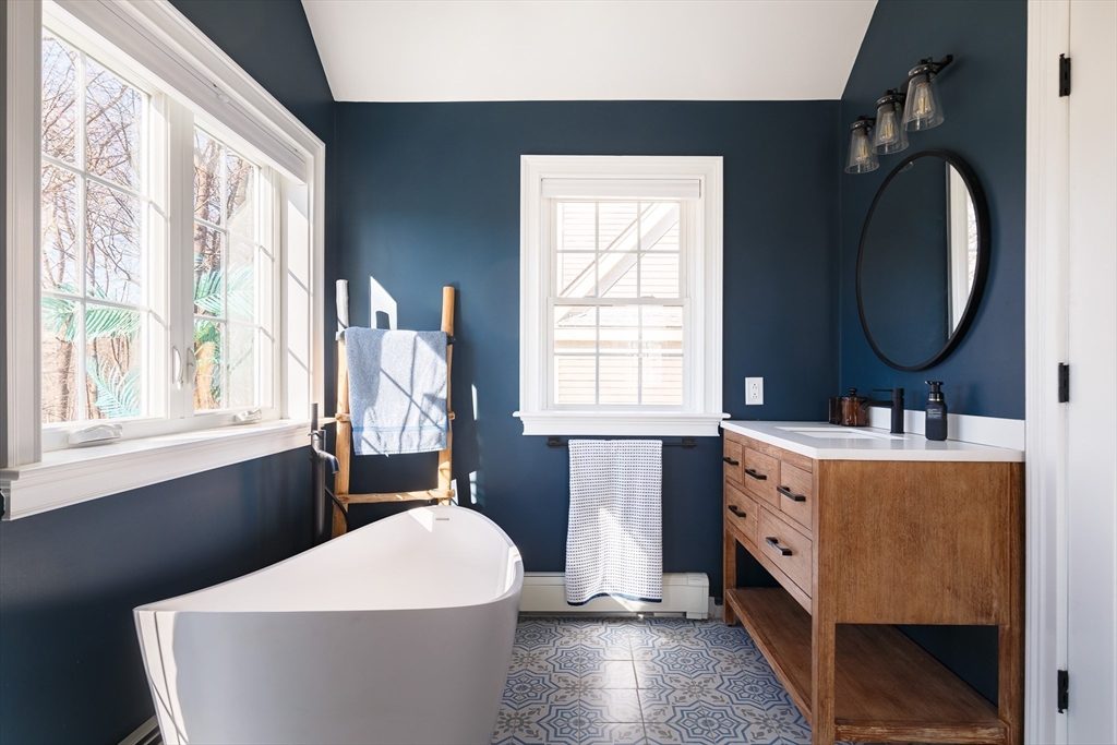 23 Regina Road Newton, MA 02466 - Photo 21 of 33 a living room with furniture and a window