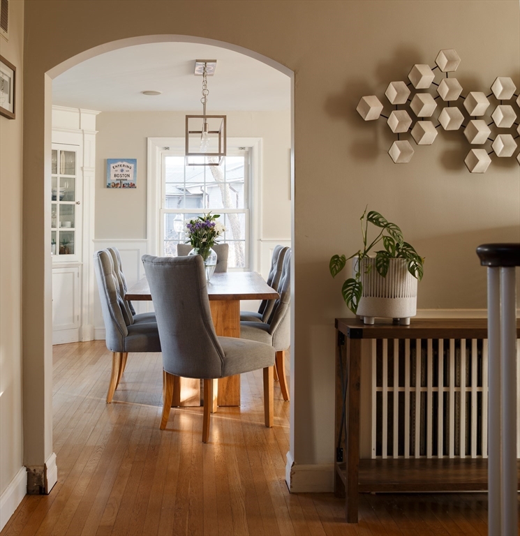 23 Regina Road Newton, MA 02466 - Photo 9 of 33 a view of a dining room with furniture window and wooden floor