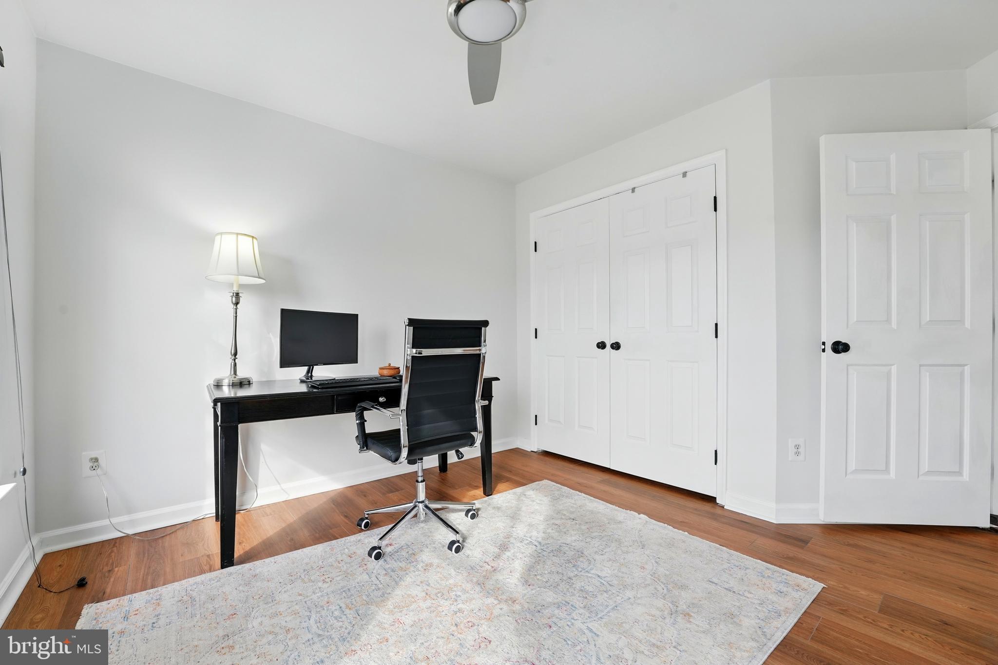 6712 Eldermill Lane Gainesville, VA 20155 - Photo 21 of 56 a view of a workspace with furniture and wooden floor