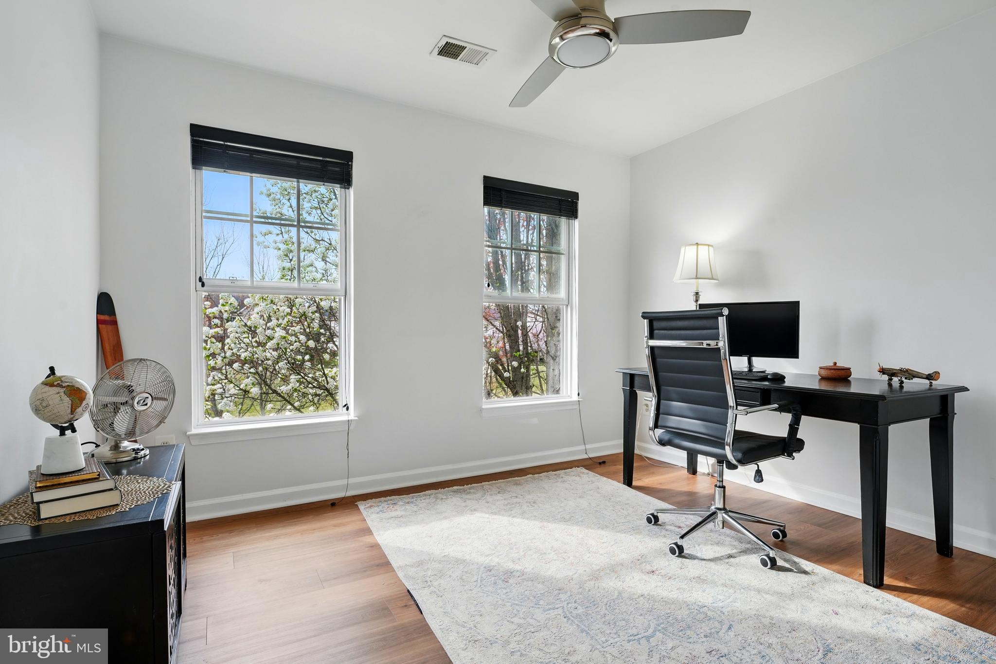 6712 Eldermill Lane Gainesville, VA 20155 - Photo 22 of 56 a living room with furniture and a window
