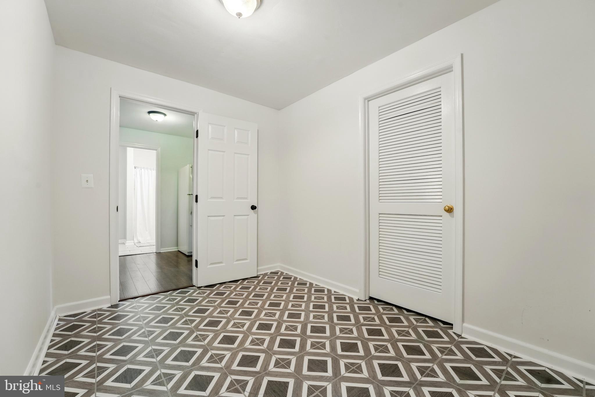 6712 Eldermill Lane Gainesville, VA 20155 - Photo 39 of 56 Tiled and painted raw storage area