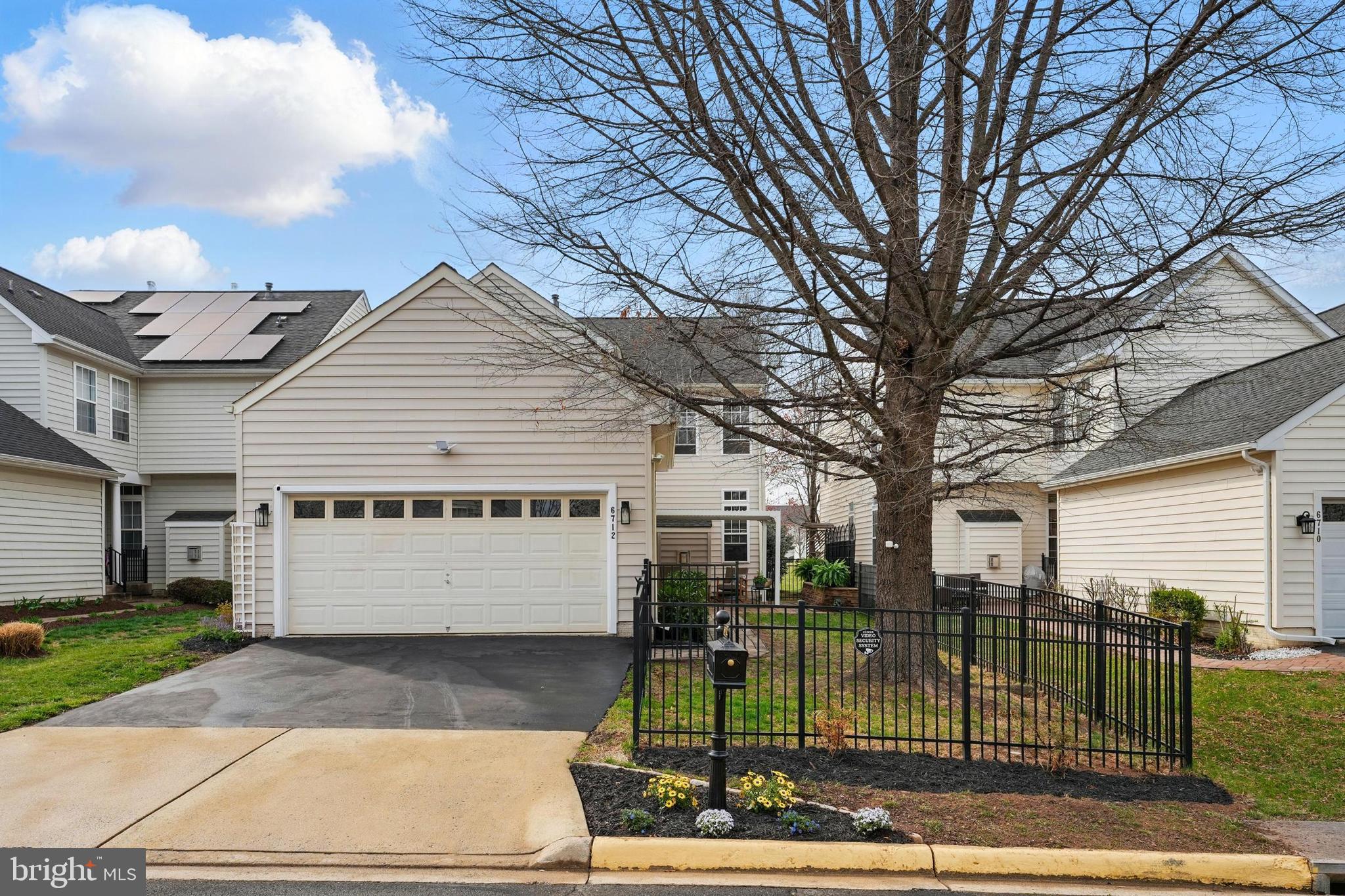 6712 Eldermill Lane Gainesville, VA 20155 - Photo 41 of 56 a sign on the side of a building