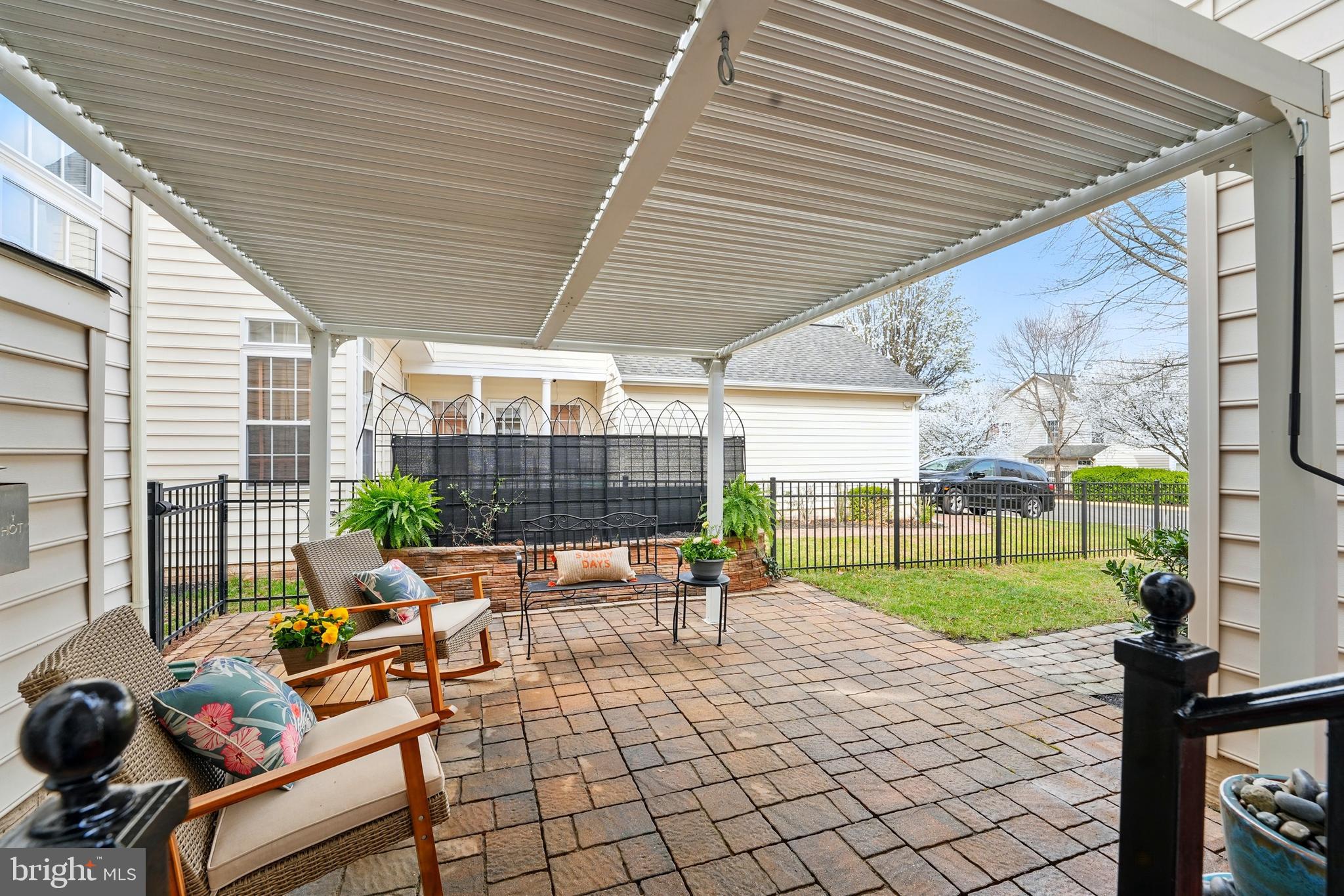 6712 Eldermill Lane Gainesville, VA 20155 - Photo 46 of 56 a outdoor space with patio furniture