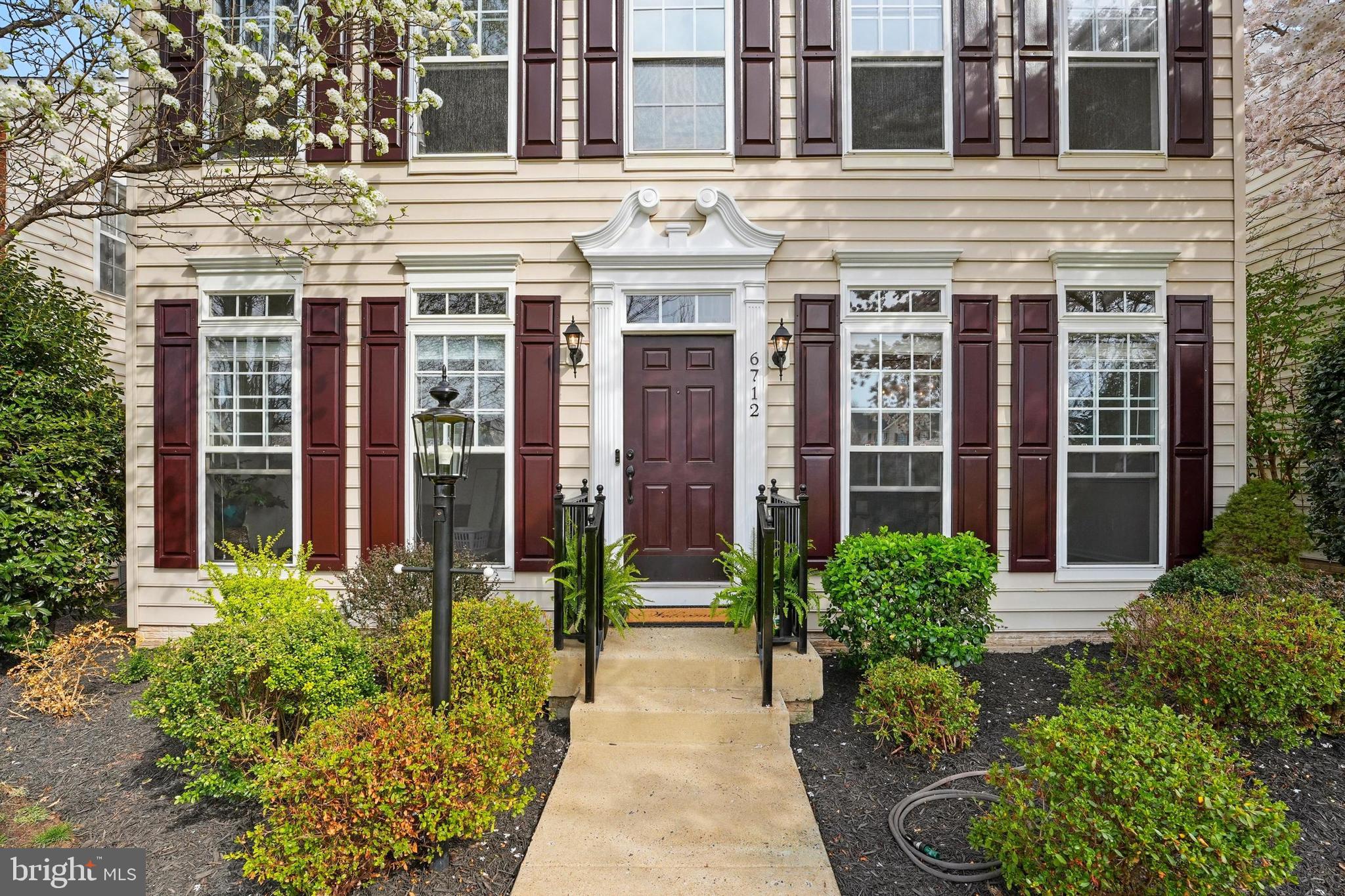 6712 Eldermill Lane Gainesville, VA 20155 - Photo 6 of 56 front view of a building