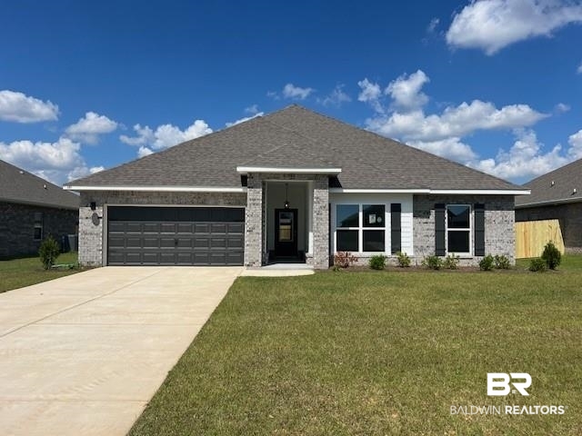149 Preston Way Gulf Shores, AL 36542 - Photo 1 of 39 View of front of property with brick siding, a front lawn, and concrete driveway