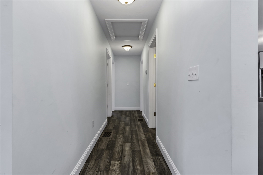 1 Lois Lane Townsend, MA 01469 - Photo 16 of 38 a view of a hallway with wooden floor