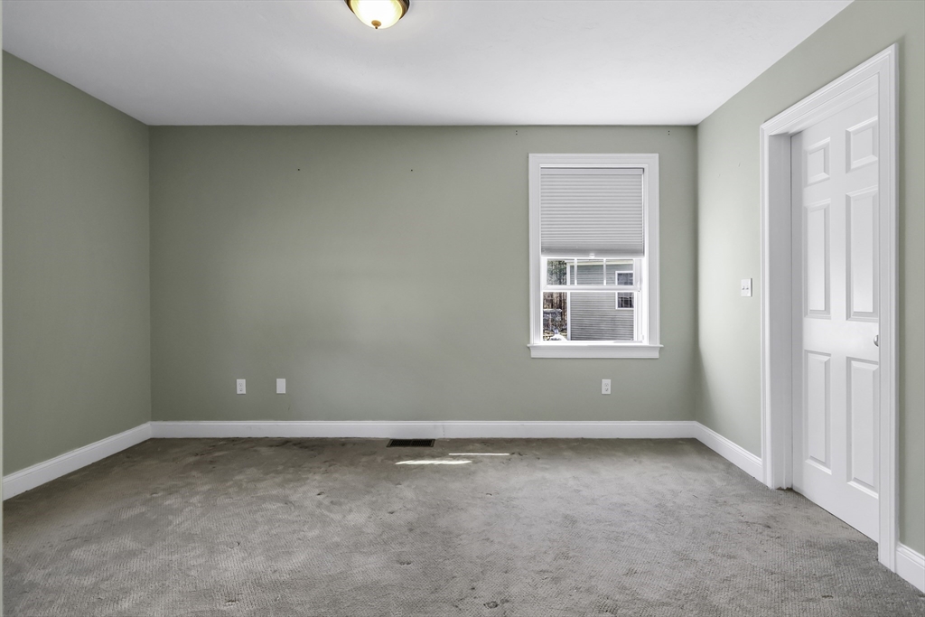 1 Lois Lane Townsend, MA 01469 - Photo 20 of 38 a view of an empty room with a window