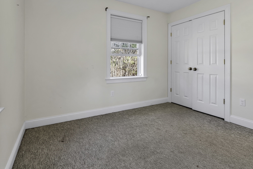 1 Lois Lane Townsend, MA 01469 - Photo 25 of 38 a view of an empty room with a window