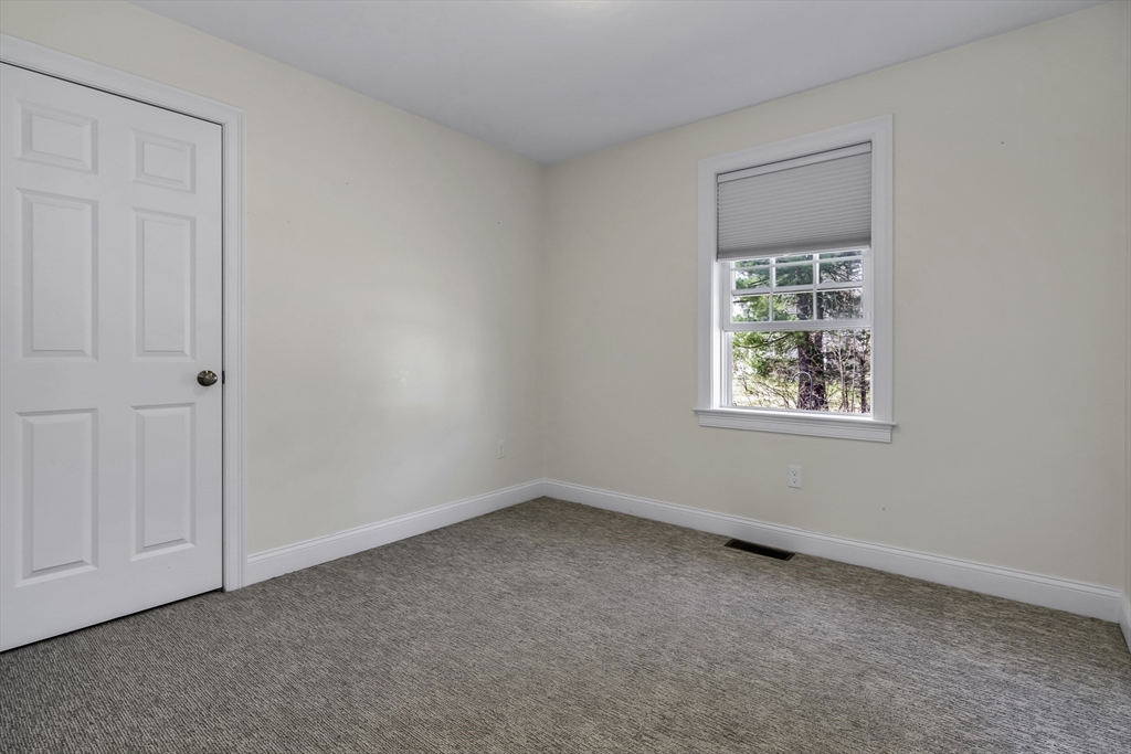 1 Lois Lane Townsend, MA 01469 - Photo 26 of 38 an empty room with a window