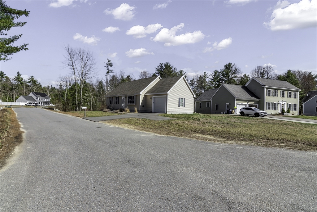 1 Lois Lane Townsend, MA 01469 - Photo 3 of 38 a view of white house with a street