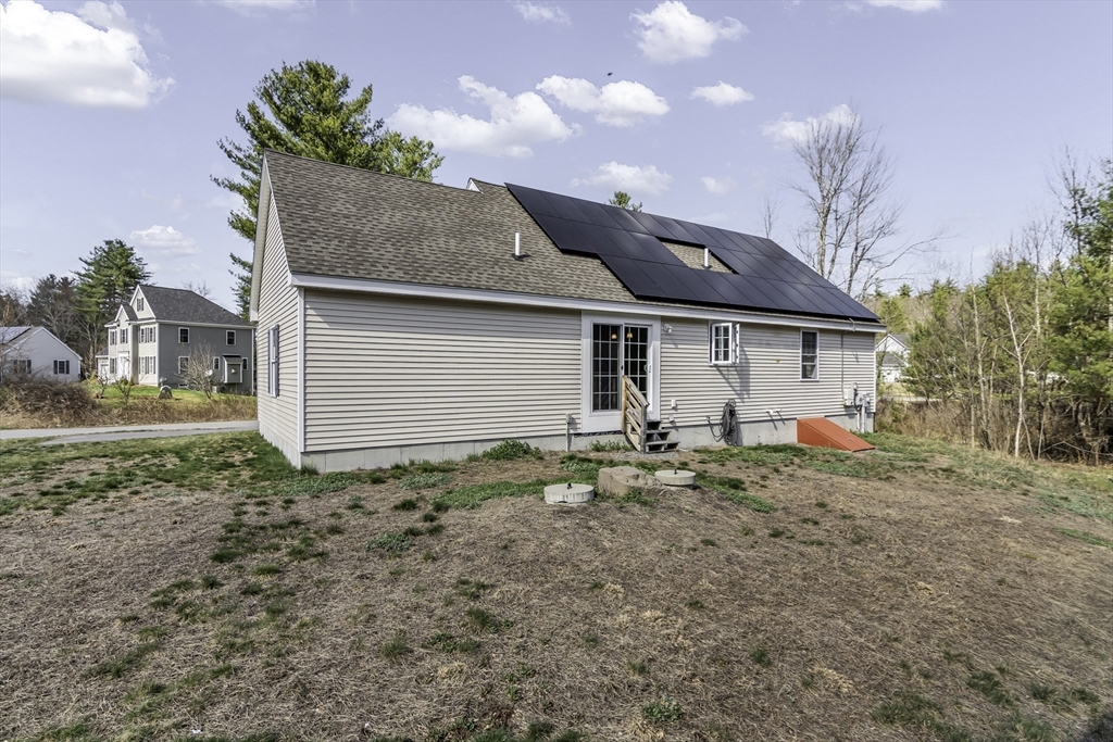 1 Lois Lane Townsend, MA 01469 - Photo 32 of 38 a house view with a backyard space